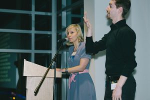HSDC Executive Director Lindsay Klarman speaks while Staff Interpreter Braden Painter interprets.